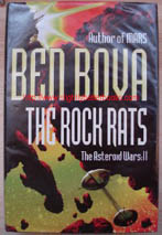 Bova, Ben. 'The Rock Rats: The Asteroid Wars: 2', published in 2002 by Hodder & Stoughton in hardback, with dustjacket, 440pp, ISBN 0340769580. Condition: Good, clean ex-library copy with some library markings; and a plastic cover protecting the exterior of the book. Price:£3.50, not including p&p, which is Amazon's standard charge (currently £2.75 for UK buyers, more for overseas customers)