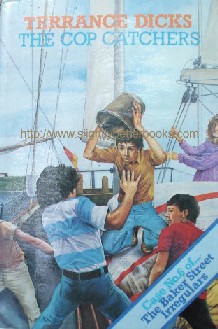 Dicks, Terrance. 'The Cop Catchers', first published in 1981 in Great Britain by The Blackie Publishing Group in hardback with dustjacket, 172pp, ISBN 0216910627. Condition: good++ clean & tidy ex-library copy (never borrowed). Price: £3.25, not including p&p, which is Amazon's standard charge (currently £2.75 for UK buyers, more for overseas customers)